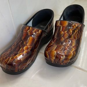 Dansko snake skin leather clogs